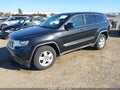 2012 Jeep Grand Cherokee — photo 2 of 11 | VIN 1C4RJEAGXCC360327