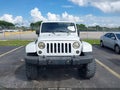 2012 Jeep Wrangler Unlimited — photo 12 of 16 | VIN 1C4BJWEG1CL186200