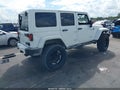 2012 Jeep Wrangler Unlimited — photo 4 of 16 | VIN 1C4BJWEG1CL186200