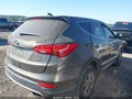 2014 Hyundai Santa Fe — photo 4 of 16 | VIN 5XYZT3LB2EG175042
