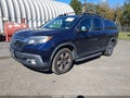 2017 Honda Ridgeline — photo 2 of 17 | VIN 5FPYK3F57HB013639