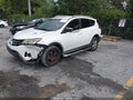 2014 Toyota RAV4 — photo 2 of 16 | VIN 2T3ZFREV3EW090858