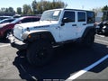 2011 Jeep Wrangler Unlimited — photo 2 of 17 | VIN 1J4BA3H18BL602807