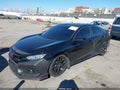 2019 Honda Civic — photo 2 of 17 | VIN 2HGFC1E54KH707176
