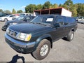 1999 Nissan Frontier — photo 2 of 11 | VIN 1N6ED26Y9XC326372