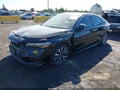 2024 Honda Civic — photo 2 of 16 | VIN 19XFL1H71RE012736