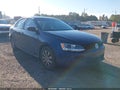 2014 Volkswagen Jetta — photo 1 of 11 | VIN 3VW2K7AJXEM209072