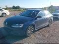 2014 Volkswagen Jetta — photo 2 of 11 | VIN 3VW2K7AJXEM209072
