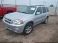 2006 Mazda Tribute — photo 2 of 12 | VIN 4F2YZ06106KM20511