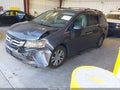 2014 Honda Odyssey — photo 2 of 17 | VIN 5FNRL5H67EB112453