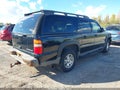 2003 Chevrolet Suburban 1500 — photo 4 of 12 | VIN 3GNFK16Z33G331078