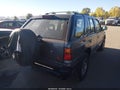 1997 Isuzu Rodeo — photo 4 of 11 | VIN 4S2CM58V0V4322446