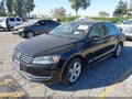 2014 Volkswagen Passat — photo 2 of 18 | VIN 1VWBT7A35EC054155