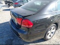 2014 Volkswagen Passat — photo 13 of 18 | VIN 1VWBT7A35EC054155