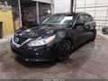 2018 Nissan Altima — photo 2 of 17 | VIN 1N4AL3AP7JC231931