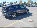 2024 Tesla Model Y — photo 4 of 17 | VIN 7SAYGDEE7RF075001