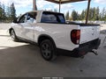 2023 Honda Ridgeline — photo 3 of 16 | VIN 5FPYK3F51PB062320