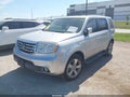 2014 Honda Pilot — photo 2 of 16 | VIN 5FNYF3H74EB025769