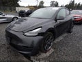 2024 Tesla Model Y — photo 2 of 21 | VIN 7SAYGDEE2RF166273