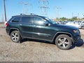 2015 Jeep Grand Cherokee — photo 13 of 16 | VIN 1C4RJFBG2FC913061