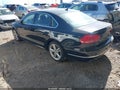 2014 Volkswagen Passat — photo 3 of 11 | VIN 1VWCT7A35EC034461