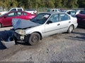 1999 Honda Civic — photo 2 of 16 | VIN 1HGEJ6677XL002770