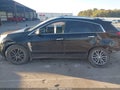 2012 Cadillac SRX — photo 14 of 16 | VIN 3GYFNAE36CS528427