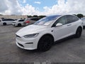 2022 Tesla Model X — photo 2 of 14 | VIN 7SAXCBE64NF332906