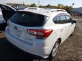 2018 Subaru Impreza — photo 4 of 16 | VIN 4S3GTAB64J3700410