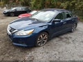 2016 Nissan Altima — photo 2 of 10 | VIN 1N4AL3AP3GN334969