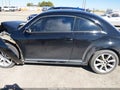 2013 Volkswagen Beetle — photo 14 of 16 | VIN 3VWJP7AT7DM669416