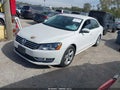 2015 Volkswagen Passat — photo 2 of 16 | VIN 1VWAP7A35FC084821