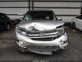 2018 Honda Pilot — photo 12 of 16 | VIN 5FNYF5H34JB023569