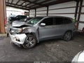 2018 Honda Pilot — photo 14 of 16 | VIN 5FNYF5H34JB023569