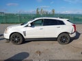 2013 Cadillac SRX — photo 14 of 16 | VIN 3GYFNGE32DS530003
