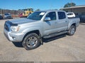 2013 Toyota Tacoma — photo 2 of 15 | VIN 5TFJU4GN9DX037062