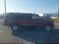 2004 Chevrolet Suburban 1500 — photo 13 of 16 | VIN 1GNEC16T34J125294