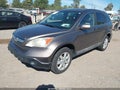 2009 Honda CR-V — photo 2 of 12 | VIN 5J6RE38749L024190