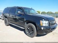 2012 Chevrolet Suburban 1500 — photo 1 of 15 | VIN 1GNSKJE77CR268582