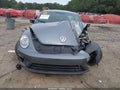 2014 Volkswagen Beetle — photo 12 of 16 | VIN 3VWVT7AT5EM631424