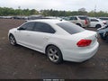 2014 Volkswagen Passat — photo 3 of 12 | VIN 1VWAT7A35EC037352
