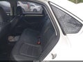 2014 Volkswagen Passat — photo 8 of 12 | VIN 1VWAT7A35EC037352