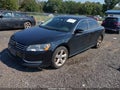 2013 Volkswagen Passat — photo 2 of 17 | VIN 1VWBP7A33DC119832