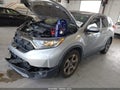 2018 Honda CR-V — photo 2 of 17 | VIN 7FARW1H86JE035770
