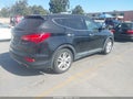 2014 Hyundai Santa Fe — photo 4 of 11 | VIN 5XYZW3LA5EG136444