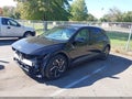 2022 Hyundai Ioniq 5 — photo 2 of 16 | VIN KM8KN4AE9NU063461