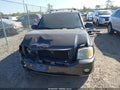 2005 GMC Envoy — photo 13 of 17 | VIN 1GKDS13SX52371245