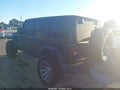 2019 Jeep Wrangler Unlimited — photo 3 of 16 | VIN 1C4HJXDN0KW689679