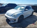 2017 Volkswagen Beetle — photo 2 of 16 | VIN 3VWJ17AT0HM601966
