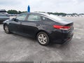 2016 Kia Optima — photo 3 of 11 | VIN 5XXGT4L31GG025159